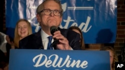Ohio Attorney General and Republican gubernatorial candidate Mike DeWine addresses supporters after winning the primary election, May 8, 2018, in Columbus. 