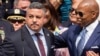 FILE - Edward Caban, left, speaks after being sworn in as NYPD police commissioner outside New York City Police Department 40th Precinct, July 17, 2023, in New York. Mayor Eric Adams on the right.