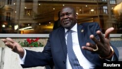 South Sudan's ex-vice president and former rebel leader Riek Machar gestures during an interview with Reuters in Rome, Italy, April 12, 2019