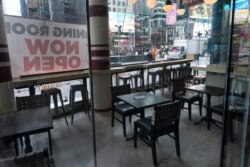 지난달 15일 미국 뉴욕에서 신종 코로나바이러스 방역 조치로 실내 영업을 할 수 없게 된 식당이 거리에 테이블을 설치했다.
