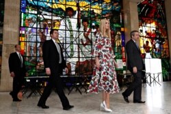 Ivanka Trump leaves the African Women's Empowerment Dialogue, with Overseas Private Investment Corp. acting CEO David Bohigian, right, and security staff, April 15, 2019, at the U.N. Economic Commission for Africa building in Addis Ababa, Ethiopia.