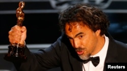 Director Alejandro Inarritu accepts the Oscar for Best Director for his film "Birdman" at the 87th Academy Awards in Hollywood, California, Feb. 22, 2015. 