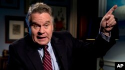 FILE - Rep. Chris Smith, R-N.J., speaks with an Associated Press reporter in his office on Capitol Hill in Washington, Nov. 20, 2015. 