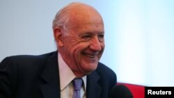 Former Argentina's Economy Minister and potential 2019 presidential candidate, Roberto Lavagna, smiles during a news conference at the Buenos Aires Grain Exchange, in Buenos Aires, Argentina, April 9, 2019. 