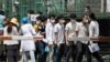Beijing Expands Quarantine Zones as Coronavirus Cases Mount 