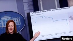 FILE - White House Press Secretary Jen Psaki delivers remarks on tax rates during a daily press briefing at the White House in Washington, April 1, 2021. 