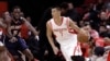 Houston Rockets' Jeremy Lin (7) drives the ball around Atlanta Hawks' DeMarre Carroll (5) in the first quarter of an NBA basketball game on Nov. 27, 2013, in Houston, Texas.