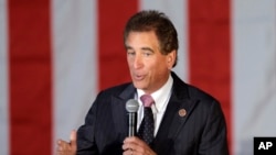 FILE – Rep. Jim Renacci, R-Ohio, speaks in Independence, Ohio, Sept. 29, 2014. Churches should have the First Amendment right to endorse political candidates and still keep their tax-free status, say House Republicans, who added a provision to a spending bill that would deny the Internal Revenue Service money to enforce the 63-year-old law prohibiting such outright politicking from the pulpit.