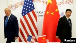 ARCHIVO - El presidente Donald Trump asiste a una reunión bilateral con el presidente de China, Xi Jinping, durante la cumbre de líderes del G20 en Osaka, Japón, el 29 de junio de 2019. 