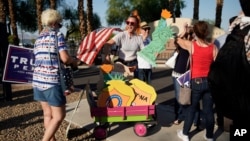 People protest Tuesday, Aug. 4, 2020, in Las Vegas against a law signed this week by Nevada Gov. Steve Sisolak to mail ballots to all of the state's active voters ahead of the November election. The law has drawn criticism from Republicans, most…