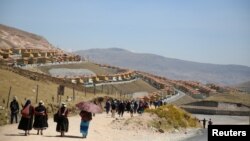 FILE PHOTO: Fuerabamba, a community that once farmed and herded animals in Peru's southern Andes, was relocated to a new town near Las Bambas, Oct. 3, 2017.