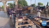 Nigeria canoe owners cash in after floods hit Maiduguri