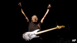 FILE - Roger Waters, formerly of the English rock band Pink Floyd, performs March 29, 2012, in Rio de Janeiro, Brazil. Waters, Paul McCartney, The Rolling Stones, Neil Young, The Who and Bob Dylan will perform at Desert Trip, which kicks off Friday.