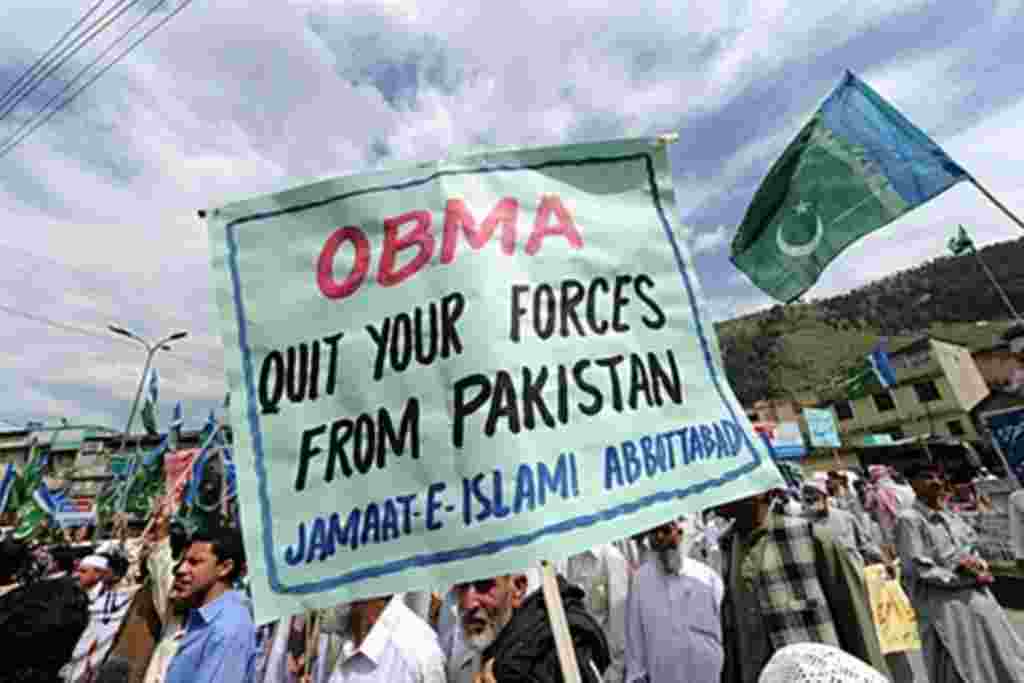 Activists of Pakistan's largest religious political party Jamaat-e-Islami (JI) march as they shout anti-US slogans during a protest rally against the US Special forces operation in Abbottabad on May 6, 2011. Hundreds of Pakistanis took to the streets on M