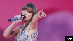 (FILES) American singer and songwriter Taylor Swift performs on stage as part of her Eras Tour in Lisbon on May 24, 2024.