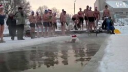 Russian Swimming Club Celebrates Christmas in Freezing Waters
