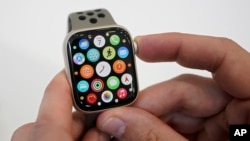 FILE - A new Apple Watch SE is on display at an Apple event on the campus of Apple's headquarters in Cupertino, Calif., Wednesday, Sept. 7, 2022. 