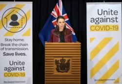 New Zealand's Prime Minister Jacinda Ardern briefs the media about the COVID-19 coronavirus at the Parliament House in Wellington, April 27, 2020.