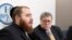 Rabbi Avi Greenstein, left, talks while Attorney General William Barr listens during a meeting of Jewish leaders at the Boro Park Jewish Community Council in New York, Jan. 28, 2020.