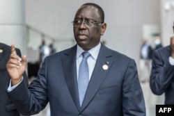 FILE - Macky Sall arrives at the Africa Union headquarters in Addis Ababa on February 19, 2023.