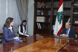 Lebanon's President Michel Aoun meets with U.S. Ambassador to Lebanon Dorothy Shea, at the presidential palace in Baabda, Lebanon, Aug. 16, 2021.
