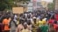 An opposition protest rally in a street of Ouagadougou, Burkina Faso. (Z. Wanogo/VOA). 