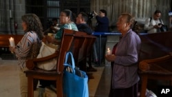 Parishioners pray for the health of Pope Francis at the Metropolitan Cathedral in Mexico City, Feb. 27, 2025.