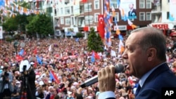 Turkey's President and ruling Justice and Development Party leader Recep Tayyip Erdogan addresses supporters during an election rally in Corlu, near Istanbul, Turkey, May 29, 2018.