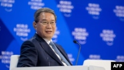 资料照：中国总理李强出席达沃斯世界经济论坛会议。（2024年1月16日）