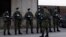 Serbian soldiers patrol around the center for refugees in Sid, about 100 kilometers west of Belgrade, Serbia, May 16, 2020. 