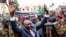 Central African Republic's new leader Michel Djotodia greets supporters at a Seleka rebel alliance rally, downtown Bangui, March 30, 2013.