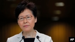 Hong Kong Chief Executive Carrie Lam Listens to reporters' questions during a press conference in Hong Kong Tuesday, Aug. 27, 2019. 