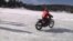 Motorcycle Racers Go Full Throttle on Frozen Lakes