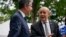 FILE - French Foreign Minister Jean-Yves Le Drian, right, and U.S. Secretary of State Antony Blinken talk during a ceremony at the French ambassador's residence in Washington, July 14, 2021.
