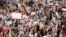 Some 1,500 people took to the streets in Helsinki to promote human and sexual rights, democracy and environmental issues July 15, 2018, ahead of Monday's summit in the Finnish capital between U.S. President Donald Trump and Russian President Vladimir Puti