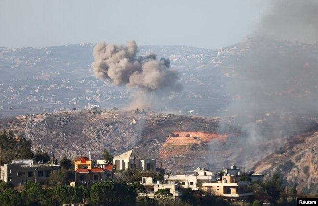 Smoke billows amid ongoing hostilities between Hezbollah and Israeli forces, as pictured from Marjayoun, near the border with Israel, Oct. 28, 2024.
