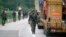 Polish soldiers, part of the peacekeeping mission in Kosovo KFOR, patrol near the northern Kosovo border crossing of Jarinje, along the Kosovo-Serbia border, Oct. 2, 2021. 