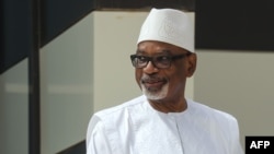 FILE - In this photo taken June 30, 2020, Mali President Ibrahim Boubacar Keita poses for a photo during the G5 Sahel summit in Nouakchott.