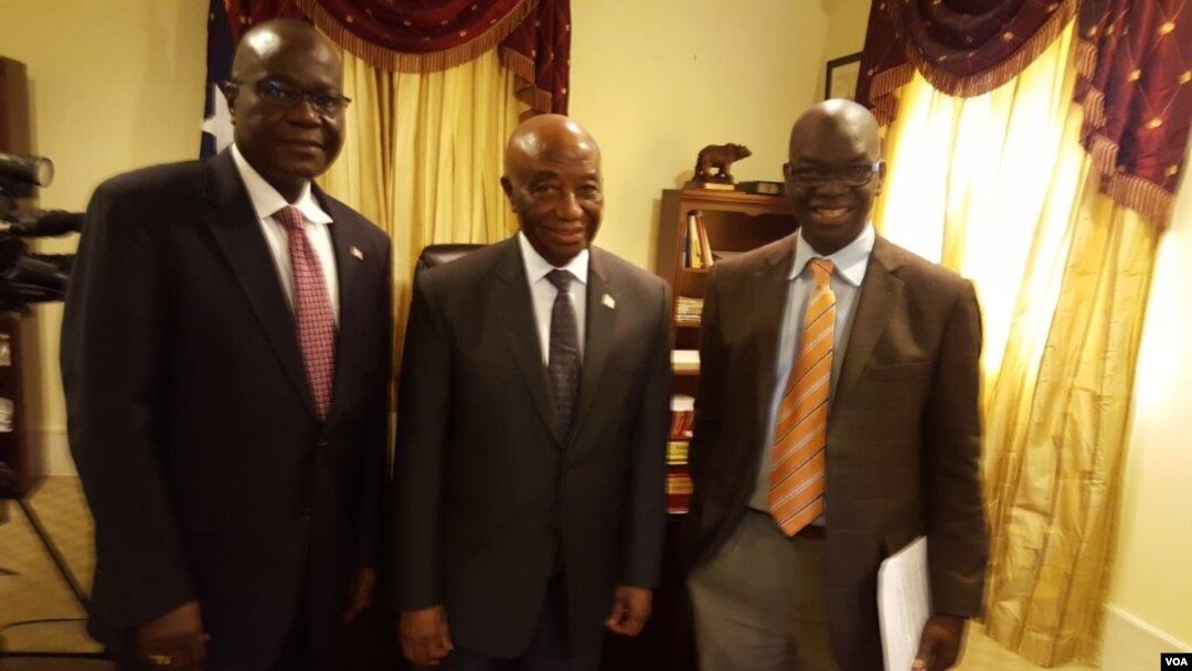 Vice President Joseph Boakai with Liberian Ambassador to the United States Jeremiah Sulunteh and VOA's James Butty.