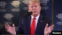 U.S. President Donald Trump gestures as he holds a news conference at the 50th World Economic Forum in Davos, Switzerland, Jan. 22, 2020. 