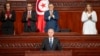 In this photo provided by the Tunisian Presidency, Tunisia's President Kais Saied is applauded after taking oath October 21, 2024 in Tunis following his reelection. 