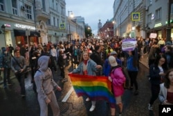 FILE – LGBTQ+ activists hold a rally in Pushkin Square in Moscow on July 15, 2020.