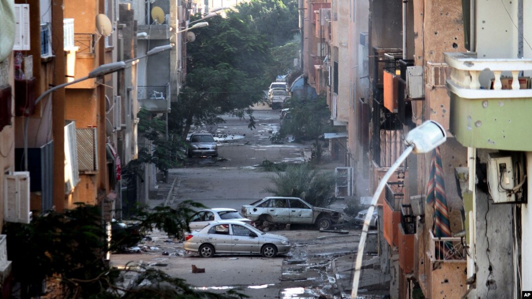 Libyan army forces fought for 10 days in late October to retake portions of Benghazi from local Islamist militias. Hundreds abandoned their homes and fighting continues. (AP)