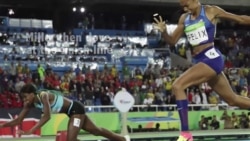 Rio 16- Shaunae Miller dives to win the 400 meter women's race