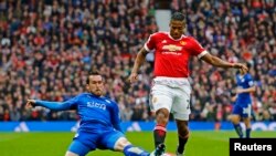 Le champion 2016, Leicester City contre Manchester United lors d'un match à Old Trafford, 5 janvier, 2016.