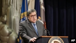 FILE - Attorney General William Barr delivers remarks to announce the establishment of the President’s Commission on Law Enforcement and the Administration of Justice, at an event at the Department of Justice Headquarters, Jan. 22, 2020 in Washington.