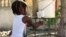 Haitian Teen Invention Keeps Neighbors' Hands Clean 
