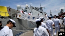 FILE - Escort squadrons of the Chinese Navy Task Group 162 boards a warship at Apapa harbour in Lagos, on July 4, 2023.