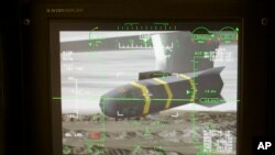 FILE - An unmanned aerial vehicle's Predator Hellfire missile is shown on a simulator's virtual camera. A Hellfire missile fired by a CIA drone killed an al-Qaida leader late on Sunday while he was riding in a car near the northwestern Syrian city of Idlib, 