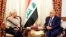 FILE - A photo released by the Iraqi Prime Minister Media Office, shows Iraqi acting Prime Minister Adil Abdul-Mahdi meeting with the U.N. special representative to Iraq Jeanine Hennis-Plasschaert, in Baghdad, Iraq, Jan. 6, 2020. 